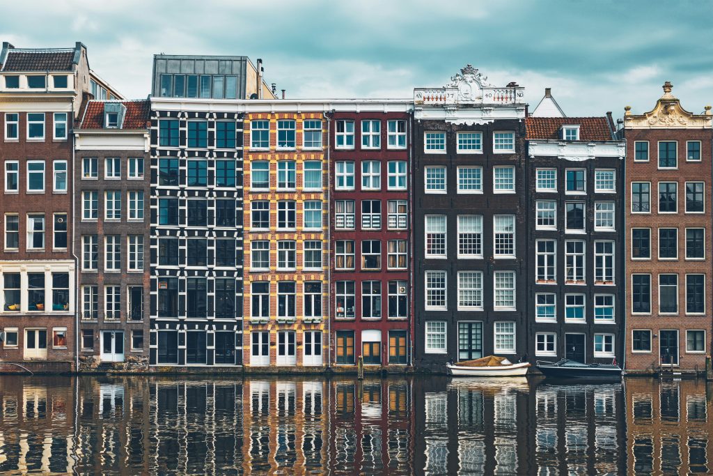 Amsterdam canal tour: Amsterdam's tall houses on the canal