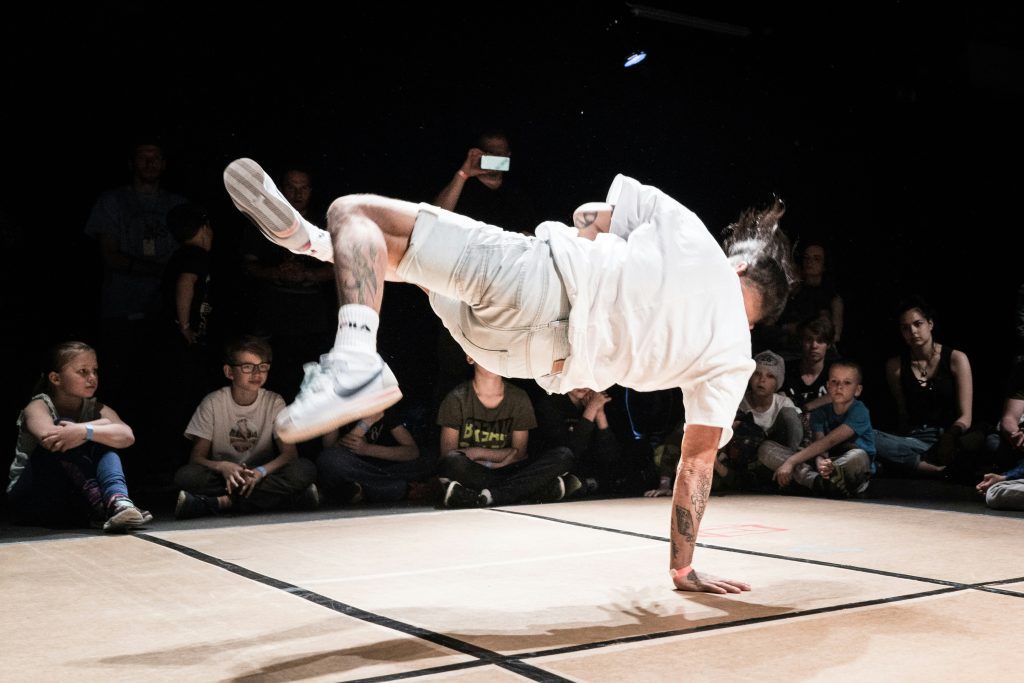 Paris 2024 Olympic Games: a break dancer showing a move at a competition