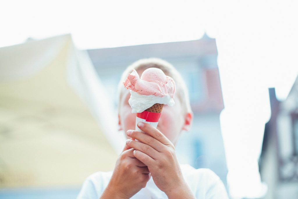 Copenhagen with kids: a kid holding an ice cream