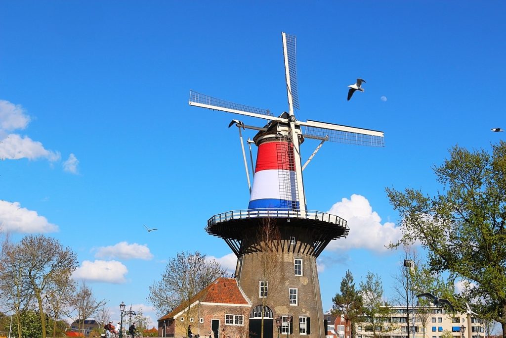 King's day Netherlands: a windmill with the color fo the Dutch flag