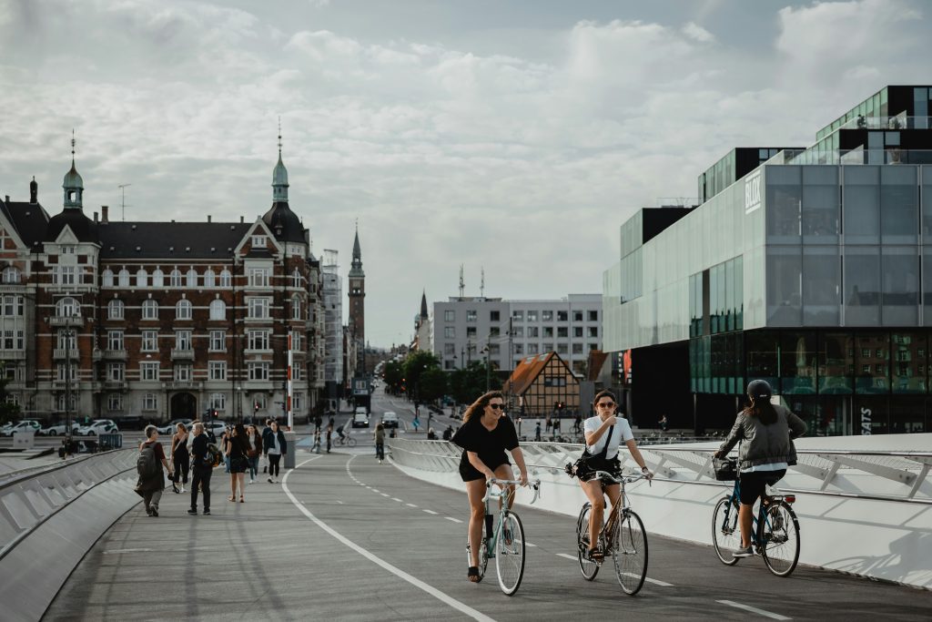 Denmark bank holidays: cyclists and pedestrians crossing Lille Langebro bridge in Copenhagen